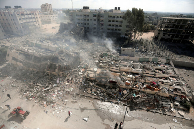 smoke-rises-from-destroyed-buildings-following-israeli-airstrikes-on-gaza-city-central-gaza-strip-thursday-oct-19-2023-ap-photomohammed-dahman