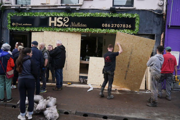 the-clean-up-gets-underway-on-main-street-in-midleton-co-cork-after-extensive-damage-caused-by-flooding-following-storm-babet-the-second-named-storm-of-the-season-swept-in-picture-date-thursday