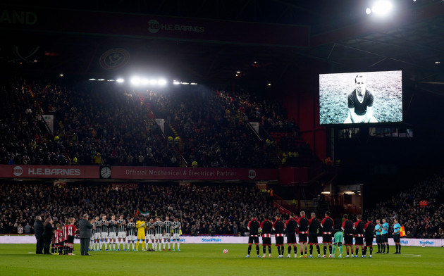 players-from-both-sides-observe-a-moments-silence-in-tribute-to-sir-bobby-charlton-who-has-died-aged-86-his-family-have-announced-today-before-the-during-the-premier-league-match-at-bramall-lane-s