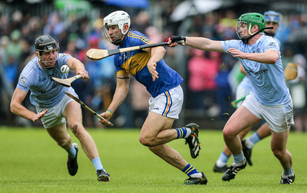 aaron-gillane-is-tackled-by-emmet-mcevoy-and-conor-boylan