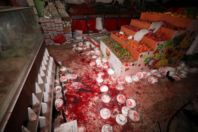 a-blood-covered-supermarket-floor-is-seen-after-israeli-israeli-bombardment-of-the-gaza-strip-in-nusseirat-refugee-camp-tuesday-oct-24-2023-ap-photoali-mohmoud