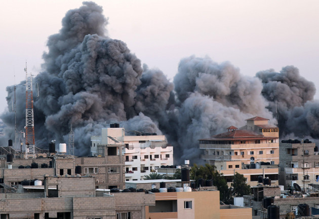 rafah-gaza-15th-oct-2023-smoke-plumes-rising-above-buildings-during-an-israeli-strike-on-rafah-in-the-sunday-gaza-strip-saturday-october-15-2023-the-united-nations-reported-that-more-than-4000