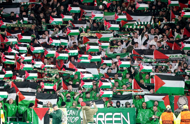celtic-fans-in-the-stands-wave-flags-of-palestine-during-the-uefa-champions-league-group-e-match-at-celtic-park-glasgow-picture-date-wednesday-october-25-2023
