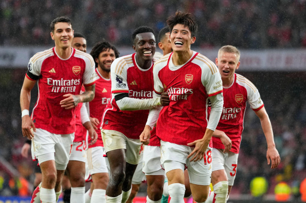 arsenals-takehiro-tomiyasu-second-right-celebrates-with-teammates-scoring-his-sides-fifth-goal-during-the-english-premier-league-soccer-match-between-arsenal-and-sheffield-united-at-emirates-stadi