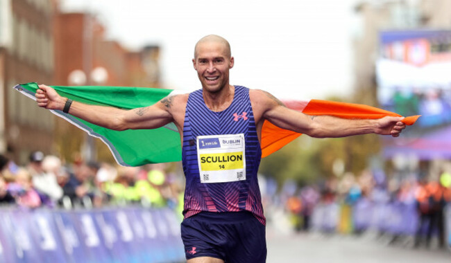 stephen-scullion-celebrates-finishing-third-in-the-mens-race