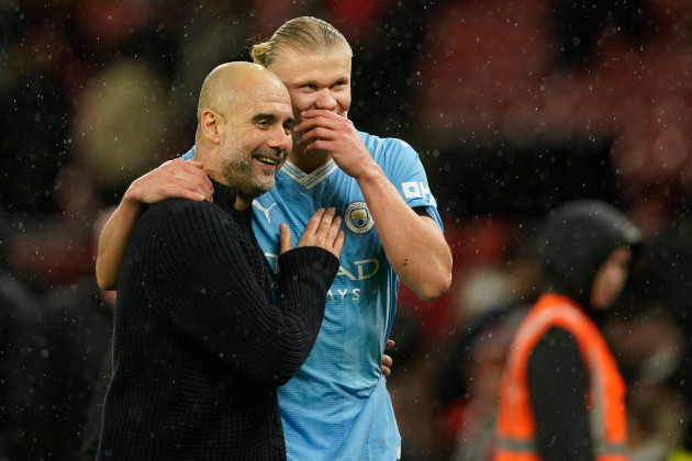 manchester-citys-head-coach-pep-guardiola-talks-to-manchester-citys-erling-haaland-after-the-english-premier-league-soccer-match-between-manchester-united-and-manchester-city-at-old-trafford-stadium