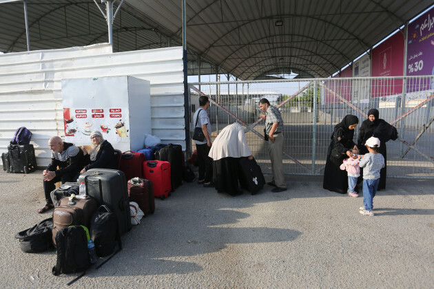 palestinains-wait-at-the-border-crossing-between-the-gaza-strip-and-egypt-in-rafah-wednesday-nov-1-2023-ap-photohatem-ali