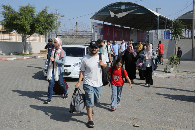 palestinians-cross-to-the-egyptian-side-of-the-border-crossing-with-the-gaza-strip-wednesday-nov-1-2023-in-rafah-wednesday-nov-1-2023-ap-photohatem-ali