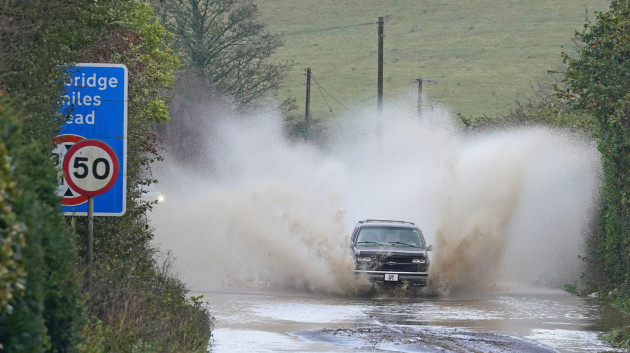 a-car-drives-through-flood-water-near-folkestone-kent-as-storm-ciaran-brings-high-winds-and-heavy-rain-along-the-south-coast-of-england-the-environment-agency-has-issued-54-warnings-where-flooding