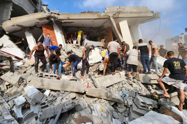 palestinians-look-for-survivors-in-the-rubble-of-a-destroyed-building-following-an-israeli-airstrike-in-bureij-refugee-camp-gaza-strip-thursday-nov-2-2023-ap-photohassan-eslaiah