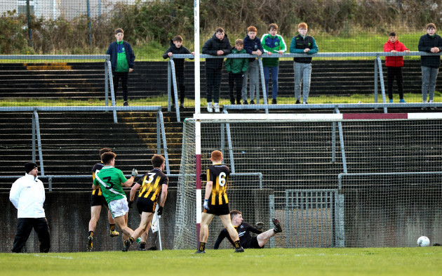 sean-kelly-shoots-past-niall-curley-of-strokestown-to-score-his-sides-first-goal-of-the-match