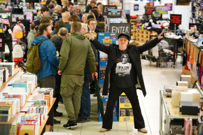 beatles-fans-at-hmv-liverpool-for-a-special-midnight-launch-event-for-the-release-of-the-last-beatles-song-now-and-then-allowing-fans-in-the-home-city-of-the-four-beatles-members-to-be-the-first-to