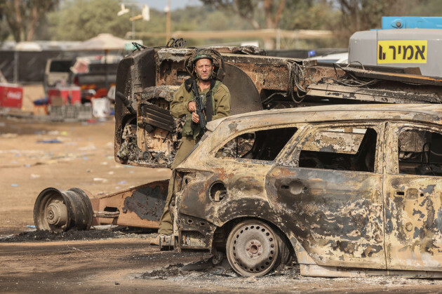 reim-israel-10-october-2023-israel-reim-an-israeli-solider-stands-at-the-grounds-of-the-supernova-electronic-music-festival-after-saturdays-deadly-attack-by-islamist-hamas-militants-where-260