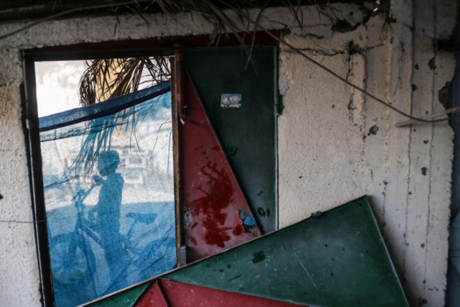 gaza-palestine-30th-oct-2023-a-palestinian-boy-seen-outside-a-destroy-home-of-the-kurd-family-where-eight-family-members-were-killed-in-an-israeli-airstrike-in-rafah-in-the-southern-gaza-strip-am