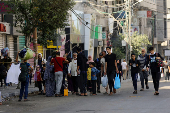 palestinians-walk-in-the-al-rimal-neighbourhood-central-gaza-city-while-fleeing-to-the-southern-gaza-strip-wednesday-nov-8-2023-ap-photoabed-khaled