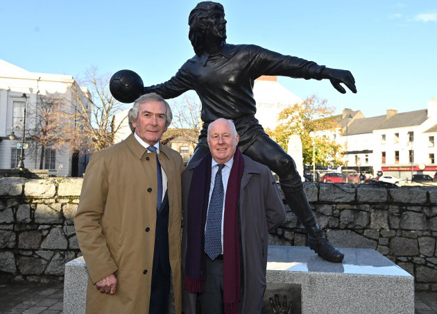 former-tottenham-and-northern-ireland-goalkeeper-pat-jennings-left-with-former-arsenal-and-ireland-player-liam-brady-during-the-unveiling-of-a-statue-in-his-honour-in-newry-town-centre-picture-da