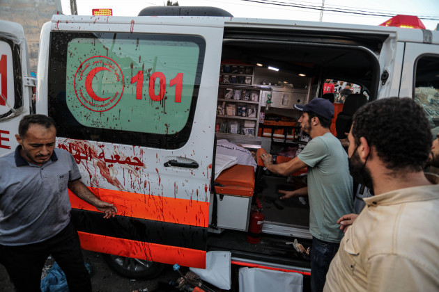 gaza-3rd-nov-2023-people-check-an-ambulance-after-an-israeli-warplane-attacked-ambulances-at-a-gate-of-the-shifa-medical-complex-in-gaza-city-on-nov-3-2023-at-least-six-palestinians-were-killed