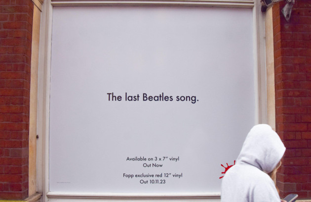 london-uk-8th-november-2023-a-pedestrian-walks-past-a-promotion-for-now-and-then-the-final-song-by-the-beatles-at-fopp-in-covent-garden-the-recently-released-track-is-set-to-hit-number-one-in