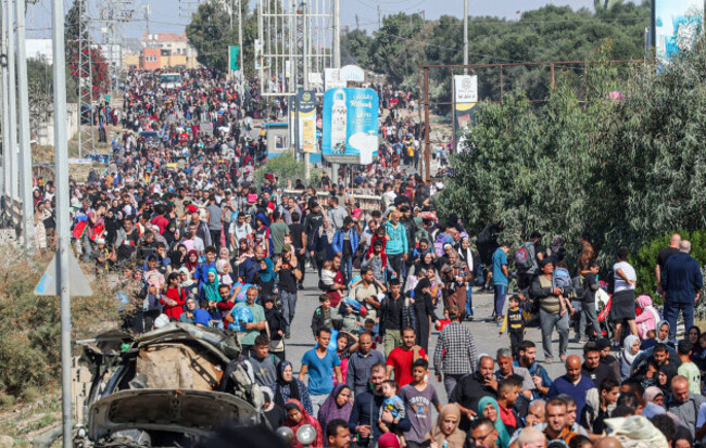 november-10-2023-gaza-palestine-palestinian-families-fleeing-gaza-city-and-other-parts-of-northern-gaza-towards-the-southern-areas-walk-along-a-road-amid-ongoing-battles-between-israel-and-the-pa