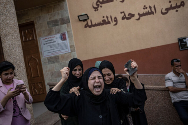 palestinians-mourn-their-relatives-killed-in-the-israeli-bombardment-of-the-gaza-strip-in-the-hospital-in-khan-younis-saturday-nov-11-2023-ap-photofatima-shbair