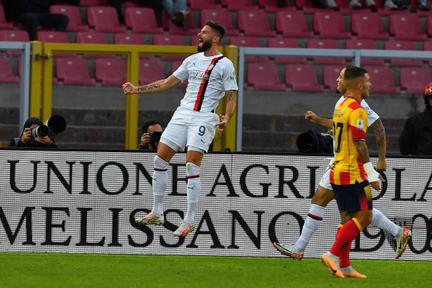 ac-milans-olivier-giroud-celebrates-scoring-his-sides-opening-goal-during-the-serie-a-soccer-match-between-lecce-and-ac-milan-at-the-via-del-mare-stadium-in-lecce-italy-saturday-nov-11-2023