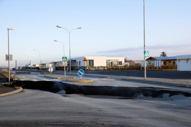 steam-rises-from-a-fissure-in-a-road-near-the-town-of-grindavik-iceland-monday-nov-13-2023-following-seismic-activity-residents-of-grindavik-a-town-in-southwestern-iceland-have-been-briefly-allo