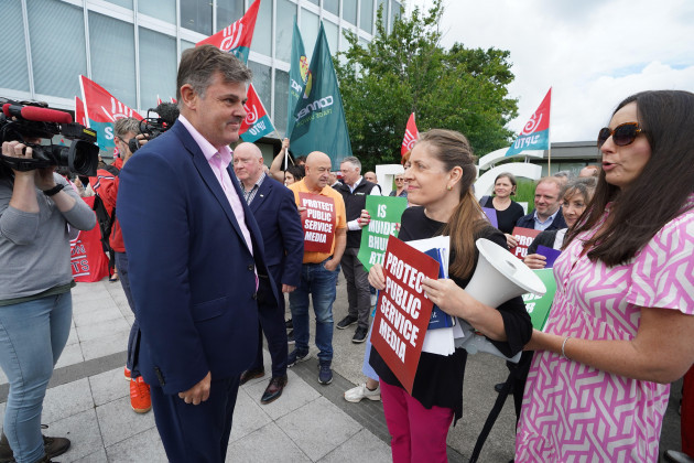 rte-director-general-kevin-bakhurst-left-meeting-emma-okelly-holding-megaphone-rte-nuj-representative-as-union-members-stage-a-rally-over-funding-of-public-service-broadcasting-at-rtes-donnybr