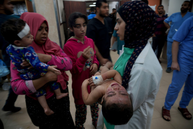palestinians-wounded-in-the-israeli-bombardment-of-the-gaza-strip-are-brought-to-a-hospital-in-deir-al-balah-on-tuesday-nov-14-2023-ap-photohatem-moussa