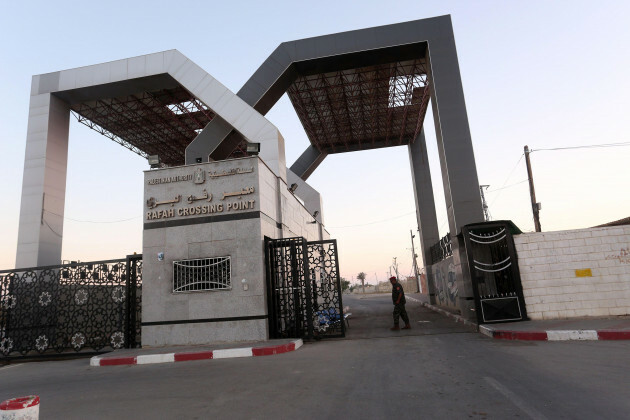 a-members-of-the-palestinian-security-forces-loyal-to-hamas-stand-guard-at-the-rafah-border-crossing-with-egypt-in-the-southern-gaza-strip-on-june-23-2019-photo-by-abed-rahim-khatibsipa-usa