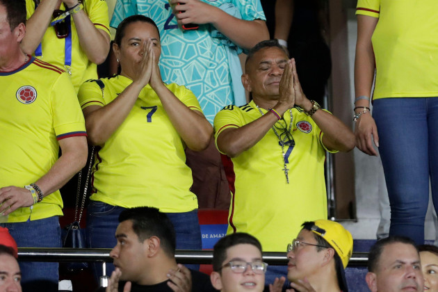parents-of-colombias-soccer-player-luiz-diaz-luis-manuel-diaz-right-and-cinelis-marulanda-holds-their-hands-in-prayer-before-the-start-a-qualifying-soccer-match-between-colombia-and-brazil-for-t