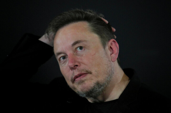 file-elon-musk-reacts-during-an-in-conversation-event-with-britains-prime-minister-rishi-sunak-in-london-thursday-nov-2-2023-ibm-has-stopped-advertising-on-social-media-platform-x-after-a-repo