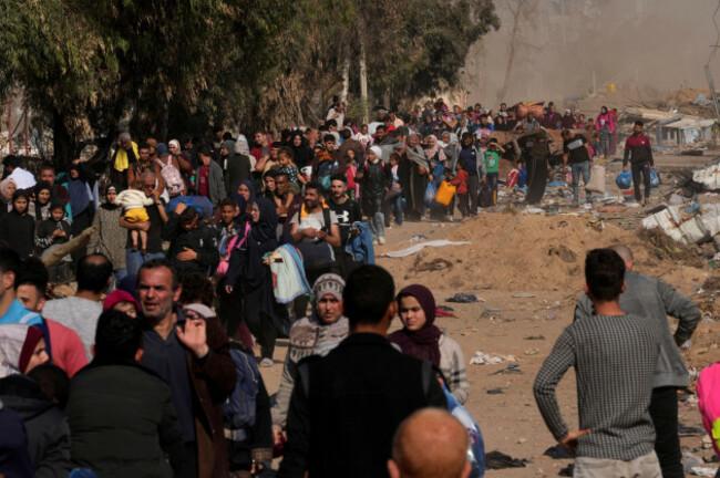 palestinians-flee-to-the-southern-gaza-strip-along-salah-al-din-street-on-the-outskirts-of-gaza-city-during-the-ongoing-israeli-bombardment-on-saturday-nov-18-2023-ap-photoadel-hana