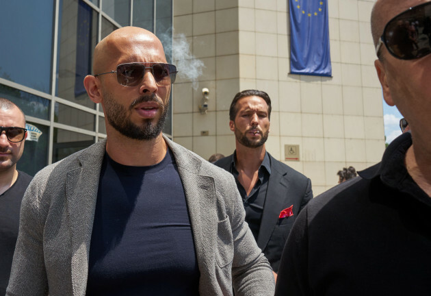 bucharest-romania-21st-june-2023-andrew-tate-and-his-brother-tristan-tate-surrounded-by-bodyguards-leave-the-bucharest-court-where-their-trial-in-the-preliminary-chamber-began-today-tate-brothe