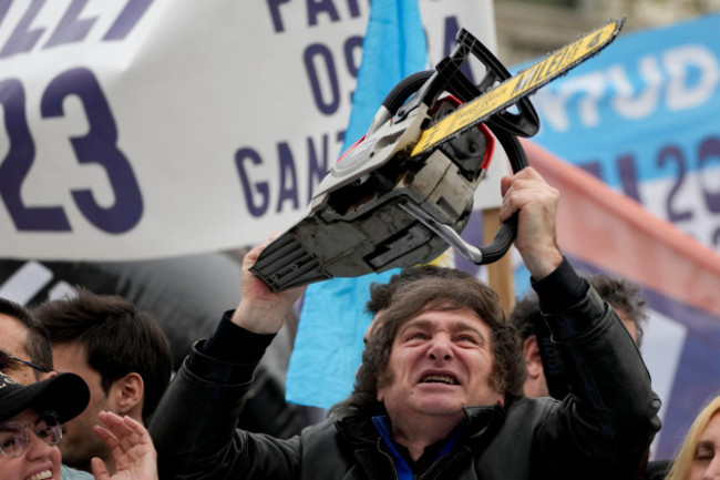 presidential-hopeful-of-the-liberty-advances-coalition-javier-milei-brandishes-a-chainsaw-during-a-campaign-event-in-la-plata-argentina-tuesday-sept-12-2023-milei-has-used-the-chainsaw-throughou