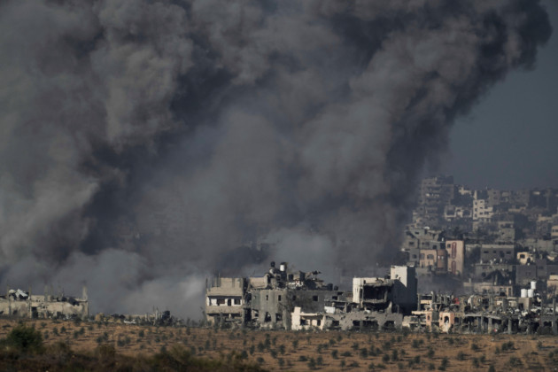 smoke-rises-following-an-israeli-airstrike-in-the-gaza-strip-as-seen-from-southern-israel-tuesday-nov-21-2023-ap-photoleo-correa