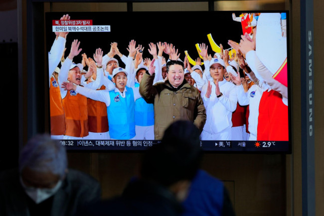 a-tv-screen-shows-a-report-of-north-koreas-spy-satellite-into-orbit-with-its-third-launch-attempt-this-year-with-an-image-of-north-koreas-leader-kim-jong-un-during-a-news-program-at-the-seoul-railwa