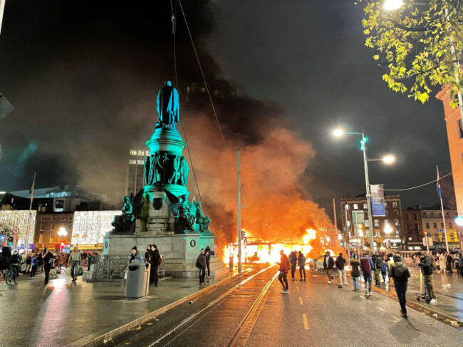 a-bus-and-car-on-fire-on-oconnell-street-in-dublin-city-centre-after-violent-scenes-unfolded-following-an-attack-on-parnell-square-east-where-five-people-were-injured-including-three-young-children