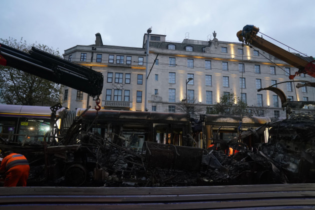 a-burned-out-luas-on-oconnell-street-in-dublin-in-the-aftermath-of-violent-scenes-in-the-city-centre-on-thursday-evening-the-unrest-came-after-an-attack-on-parnell-square-east-where-five-people-wer