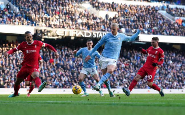 manchester-citys-erling-haaland-shoots-towards-goal-under-pressure-during-the-premier-league-match-at-the-etihad-stadium-manchester-picture-date-saturday-november-25-2023