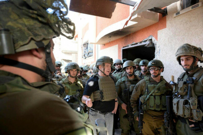 israels-prime-minister-benjamin-netanyahu-centre-speaks-to-soldiers-as-he-visits-the-gaza-strip-where-he-received-security-briefings-with-commanders-and-soldiers-and-visited-one-of-the-tunnels-tha