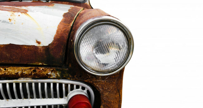 antiquecarswithrust-detailofthefrontheadlightof
