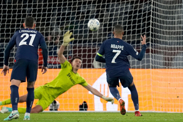 psgs-kylian-mbappe-right-scores-his-sides-first-goal-from-the-penalty-spot-during-the-champions-league-group-f-soccer-match-between-paris-saint-germain-and-newcastle-united-fc-at-the-parc-des-prin