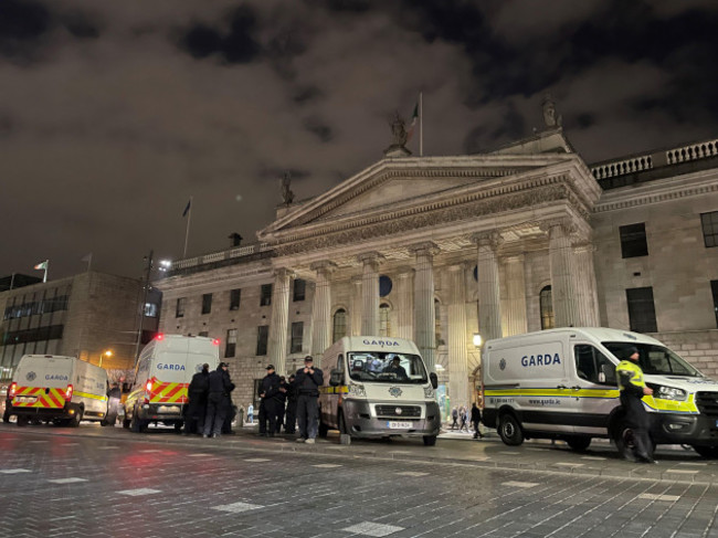 garda-outside-the-general-post-office-on-oconnell-street-in-dublin-following-violent-scenes-in-the-city-centre-on-thursday-evening-the-unrest-came-after-an-attack-on-parnell-square-east-where-five-p