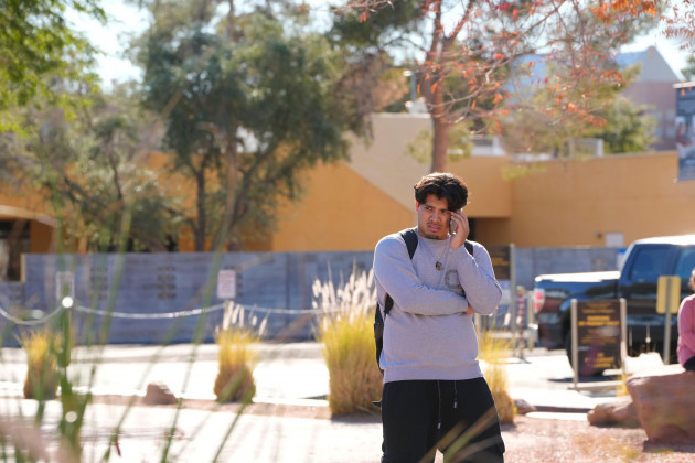 a-university-of-nevada-las-vegas-student-talks-on-his-cellphone-after-a-shooting-reported-on-campus-wednesday-dec-6-2023-in-las-vegas-ap-photolucas-peltier