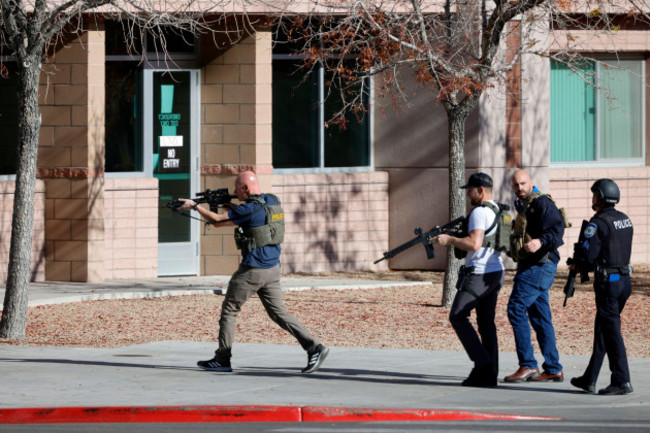 law-enforcement-officers-head-into-the-university-of-nevada-las-vegas-campus-after-reports-of-an-active-shooter-wednesday-dec-6-2023-in-las-vegas-steve-marcuslas-vegas-sun-via-ap