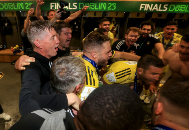 ronan-ogara-and-philippe-gardent-join-the-celebrations-led-by-romain-sazy-in-the-changing-tooms