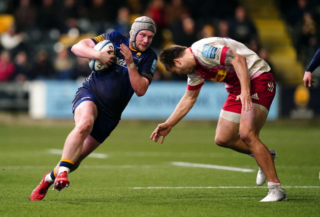 worcester-warriors-niall-annett-is-tackled-by-harlequins-andre-esterhuizen-during-the-gallagher-premiership-match-at-the-sixways-stadium-worcester-picture-date-friday-february-25-2022