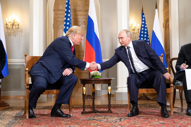 russian-president-vladimir-putin-shakes-hands-with-u-s-president-donald-trump-during-the-u-s-russia-summit-meeting-at-the-presidential-palace-july-16-2018-in-helsinki-finland