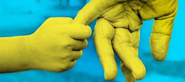 Design for NEXT OF KIN - A child hands holding on to the finger of an older person's hand.