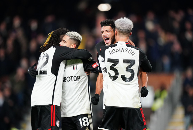 fulhams-raul-jimenez-celebrates-scoring-his-sides-second-goal-with-antonee-robinson-during-the-premier-league-match-at-craven-cottage-london-picture-date-wednesday-december-6-2023